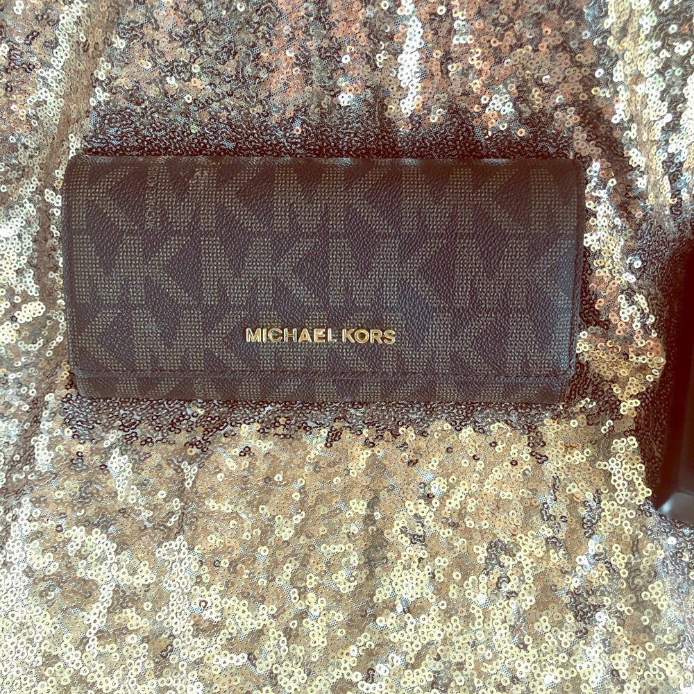 Authentic Michael Kors Checkbook wallet.